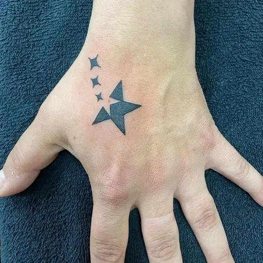 Star Tattoo on Hand Meaning: The significance and patterns of star tattoos on the hand are elaborated.