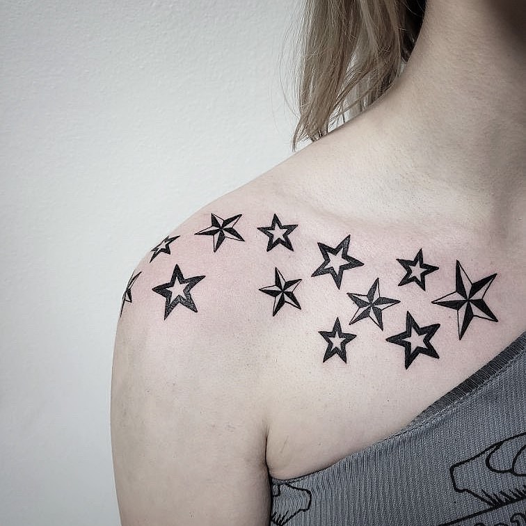 Star Tattoo On Shoulder Meaning: The Significance of Star Tattoo Designs on the Shoulder Region.