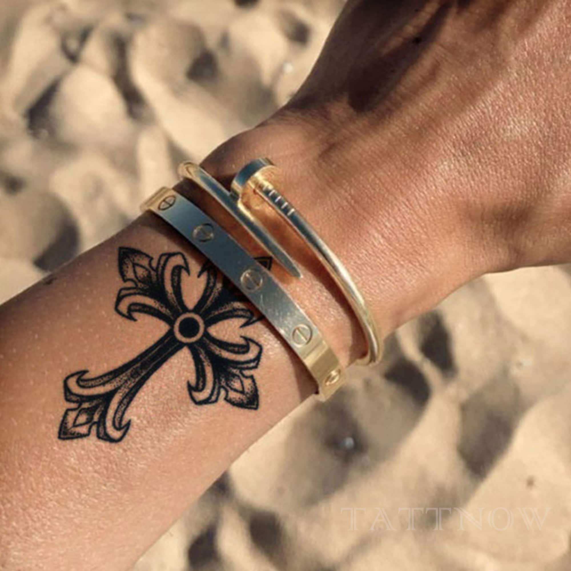 Wrist Cross Tattoo Meaning: The Deeper Meanings Behind Popular Tattoo Designs
