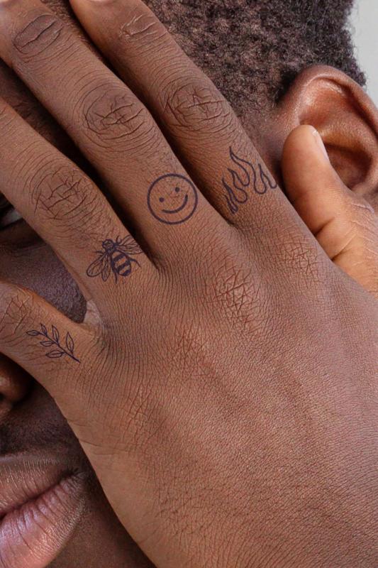 Small Finger Tattoos with Meaning: Small Finger Tattoos and Their Enchanting Tales