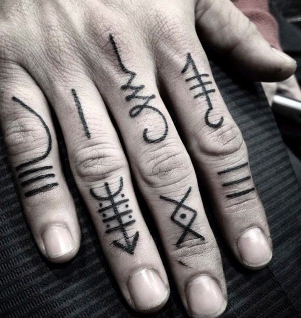 Decoding the Symbolism Behind Top 15 Hand Tattoos for Men