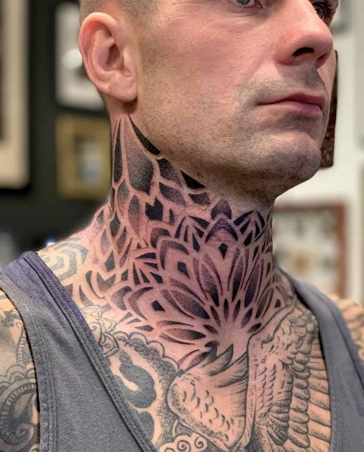 Top 15 Neck Tattoos for Men: Stylish Neck Tattoo Ideas for the Modern Man